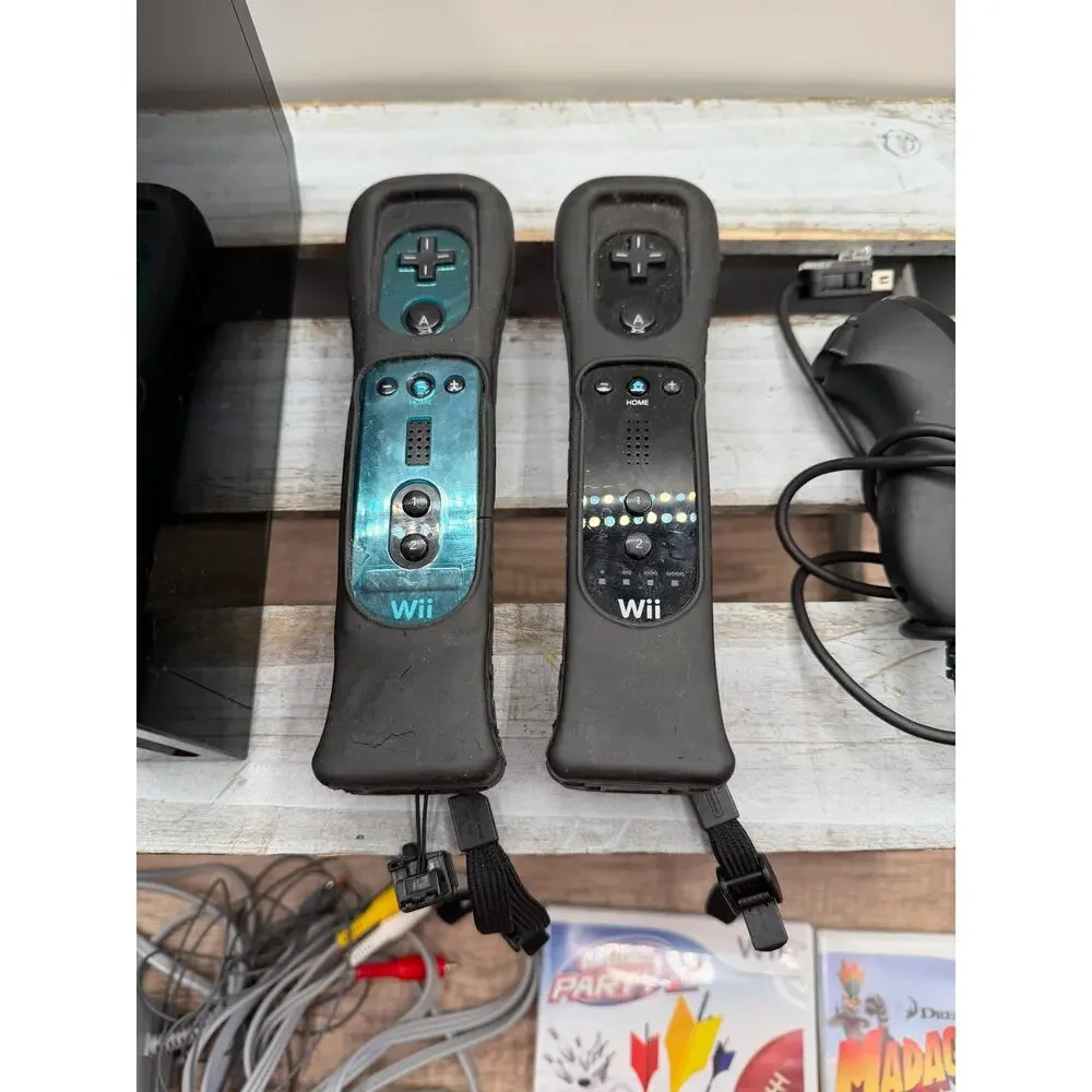 Nintendo Wii Black Console Bundle with 2 Remotes, Nunchuk & 2 Games